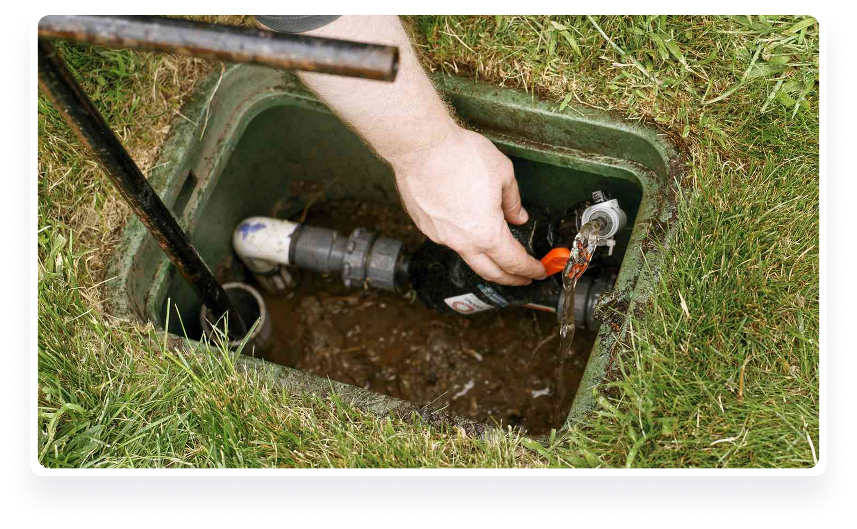 A technician testing the performance of a sprinkler system in Washington
